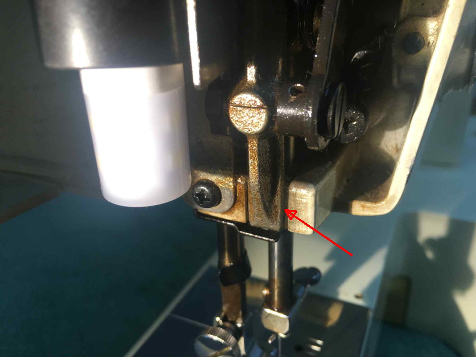 Gummed up zigzag mechanism. Sewing machine servicing business UK.